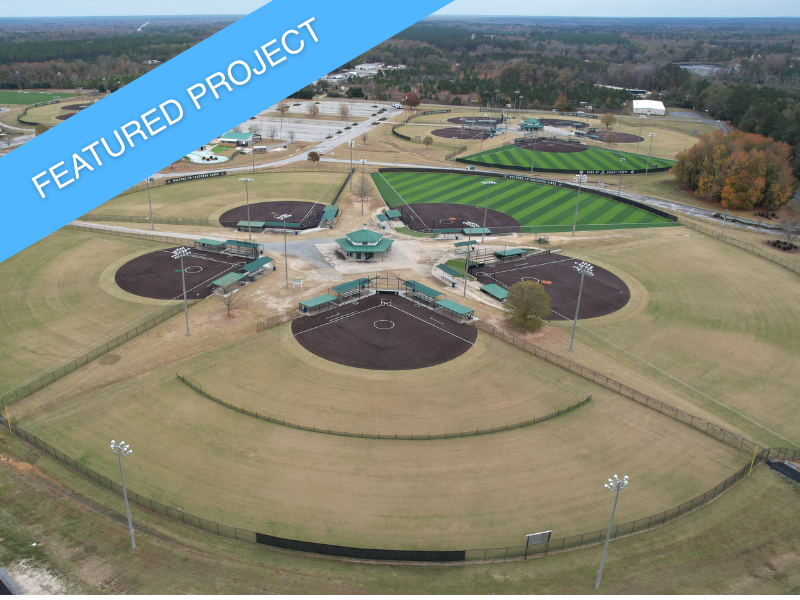 An aerial overview of the Southern Pines Recreational Complex, showing the variety of synthetic turf fields and courts.