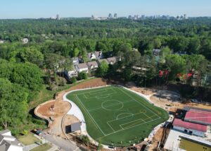 The new multi-use field at Lynwood Park, with a playground and other park amenities in the background.