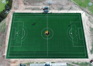 The new athletic field at Pfieffer University, featuring the Falcons logo and Shaw Sports Turf.