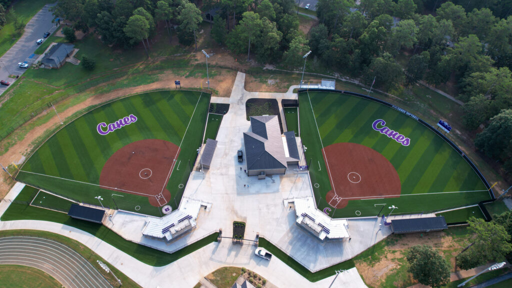 Wide aerial that shows the two fields in thei park setting.